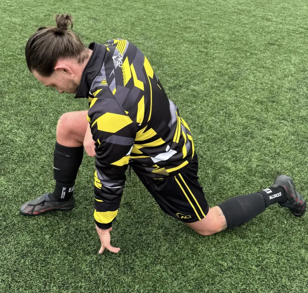 Yellow Peaq football kit, sublimated panel detail.